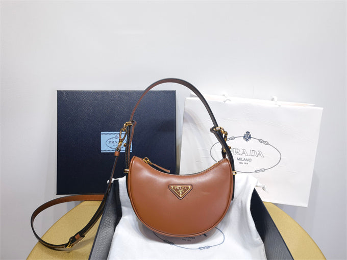 Prada Arqué mini leather shoulder bag brown