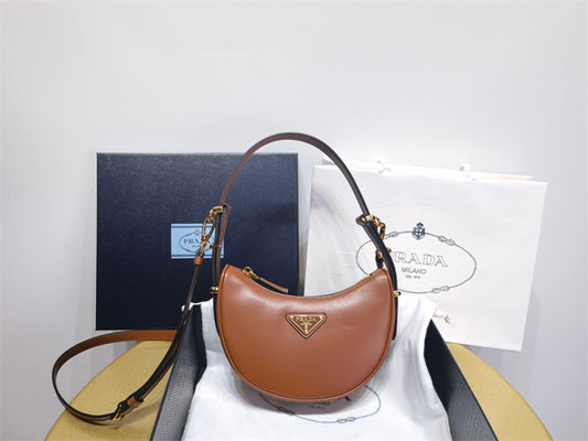 Prada Arqué mini leather shoulder bag brown